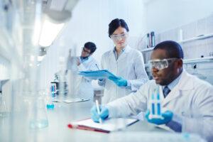 scientists analyzing substances in laboratory