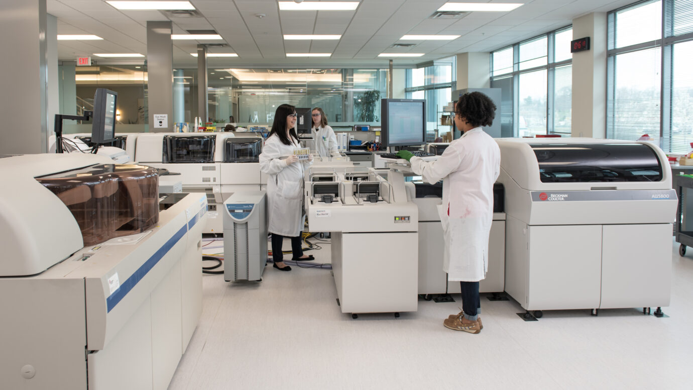 scientist working with medical machine