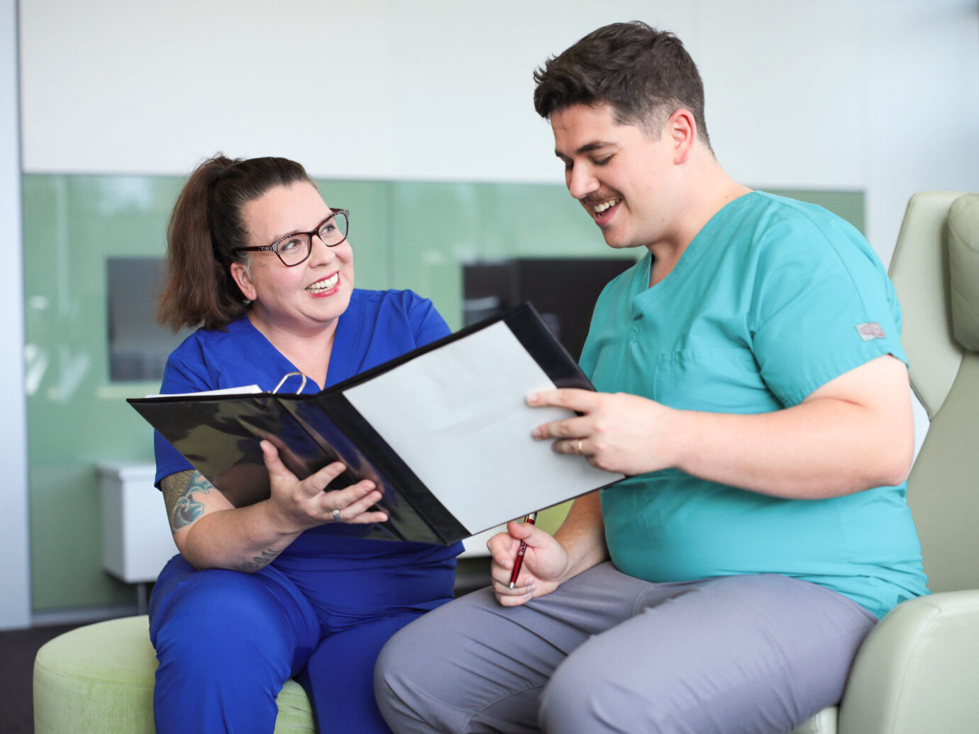 nurses working inside binder